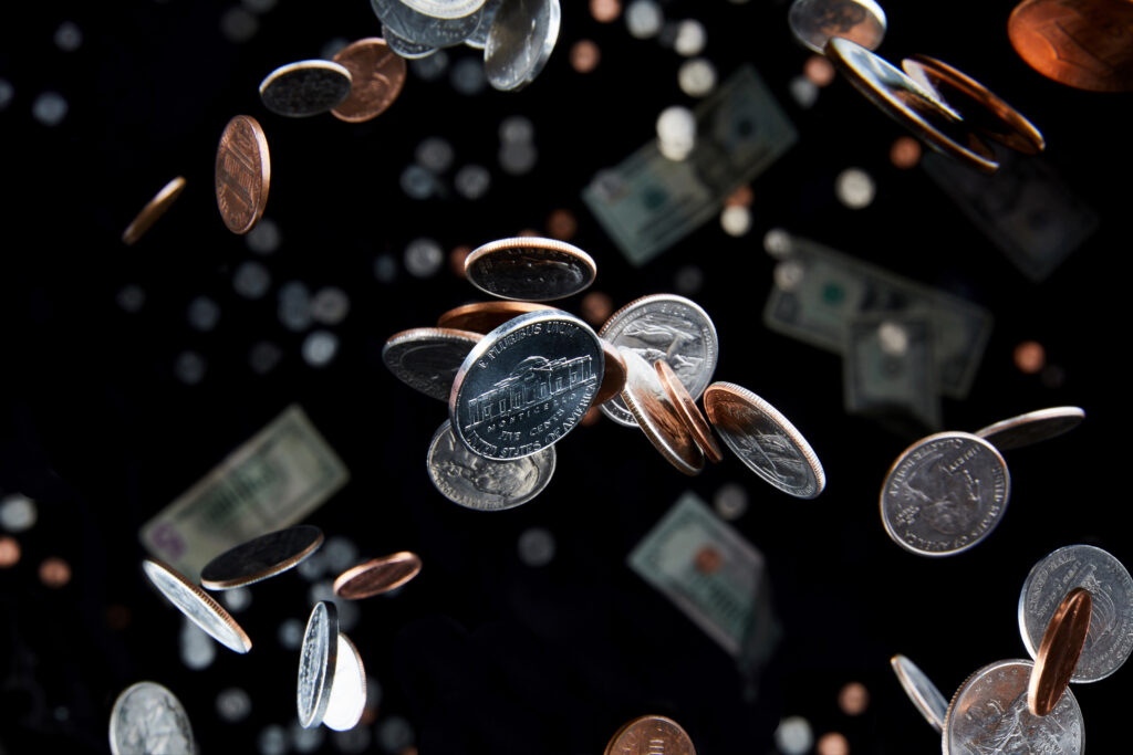 image of coins falling